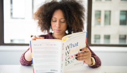 lady reading 'what would google do'