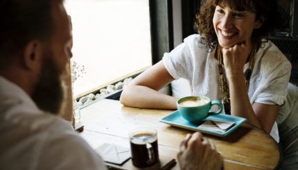 people talking over a coffee